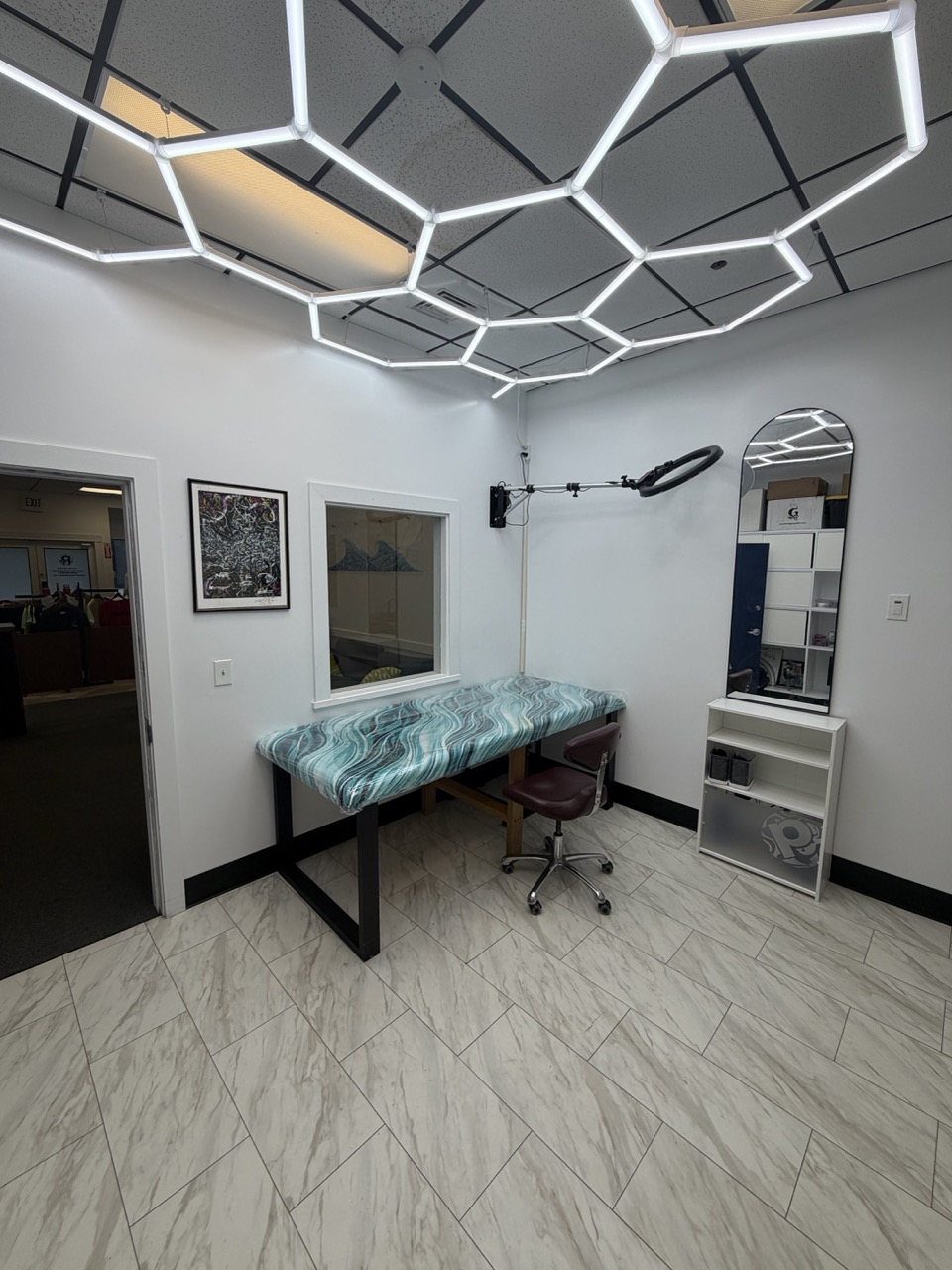 Private tattoo work area inside Pride Ink Maui